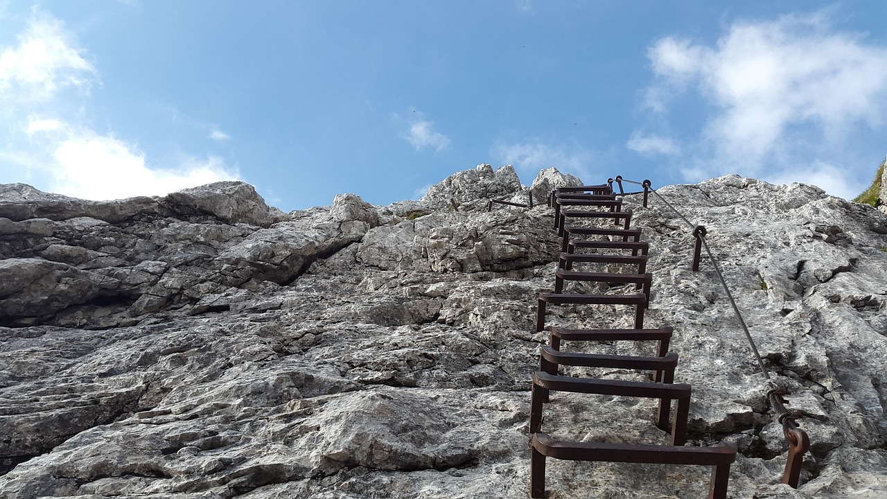 Climber on a via ferrata route in the Dolomites